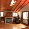 This is the new master bedroom.  Built-ins included bookcases, as well as remote controlled gas fireplace, video and audio systems, venting skylights and ceiling fan. 