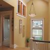 Second floor landing includes  skylights that bring light into center of the house.  High interior windows bring light into a new bath, which also has an exterior window.