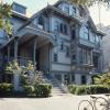 Front view after restoration shows open porch and new windows in stairwell (view of San Francisco Bay from landing was too good to give up).